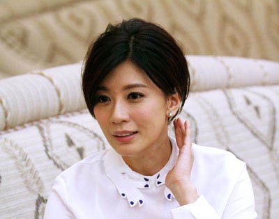 贾静雯拒让女儿当童星 享受单身暂不考虑新感情